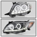 Toyota Corolla 09-10 Strålkastare Projektor - LED Halo - DRL - Svarta Spyder Auto